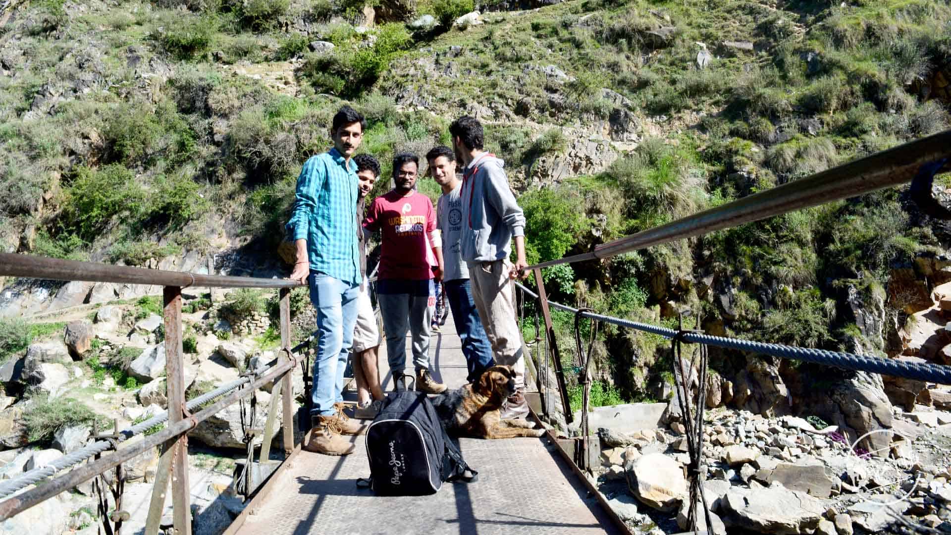 crossing bridge during Grahan Village Trek